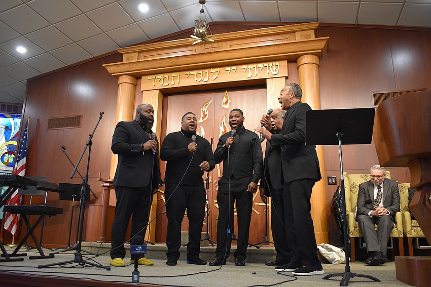 The Light of the World Men's Ensemble performs at Temple Emanu-El in anticipation of Martin Luther King Jr. Day.