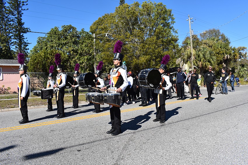 Booker High School's Marching Band plays various rhythms as they march to Martin Luther King Jr. Memorial Park.