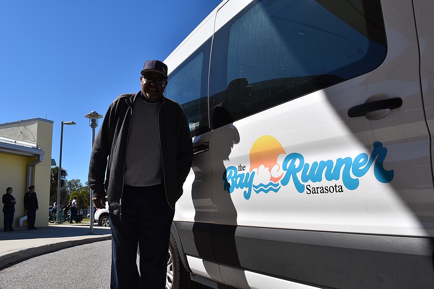 James Williams provides free transportation for the marchers on the Bay Runner.