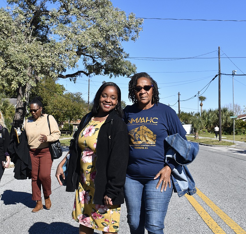 Cherlottia Argrett and Donna Brown march on Martin Luther King Jr Way