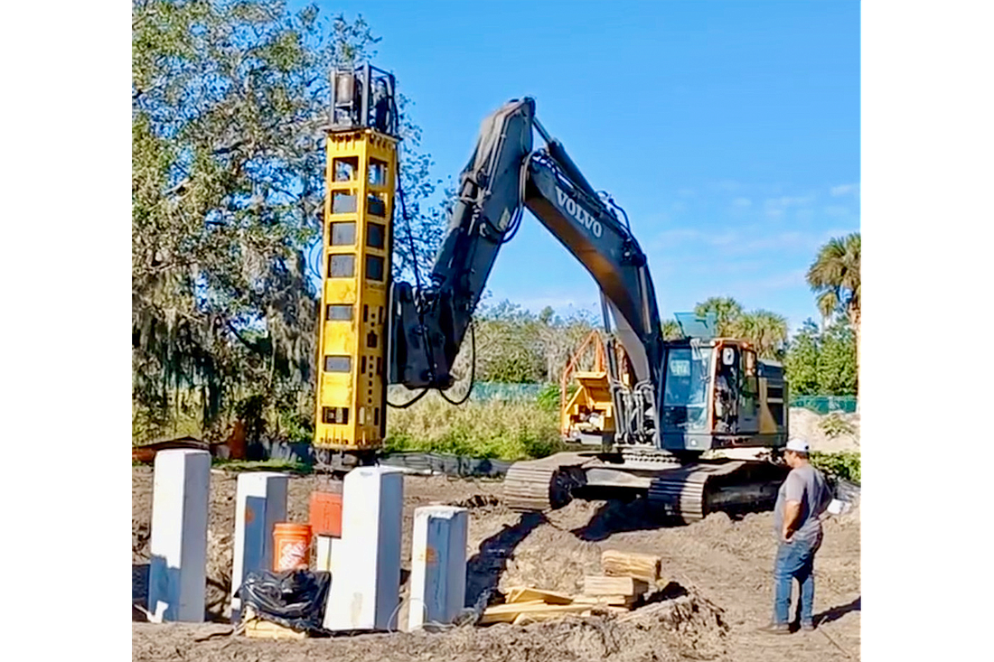 Piles are driven as part of the construction of a pedestrian bridge over Phillippi Creek in the Pinecraft neighborhood.