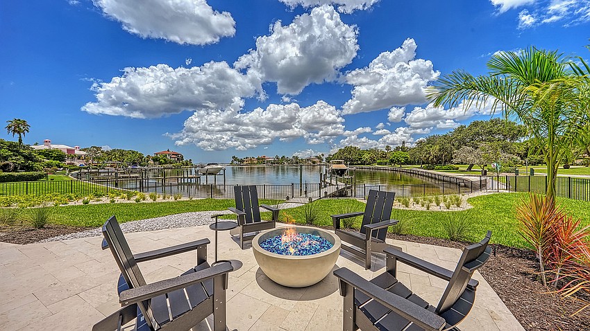 The property overlooks a canal with direct access to Sarasota Bay.