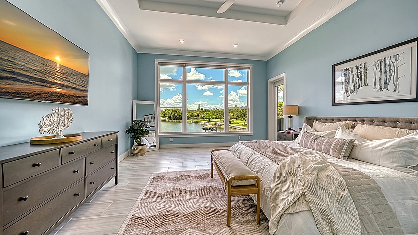 The master suite overlooks the water.