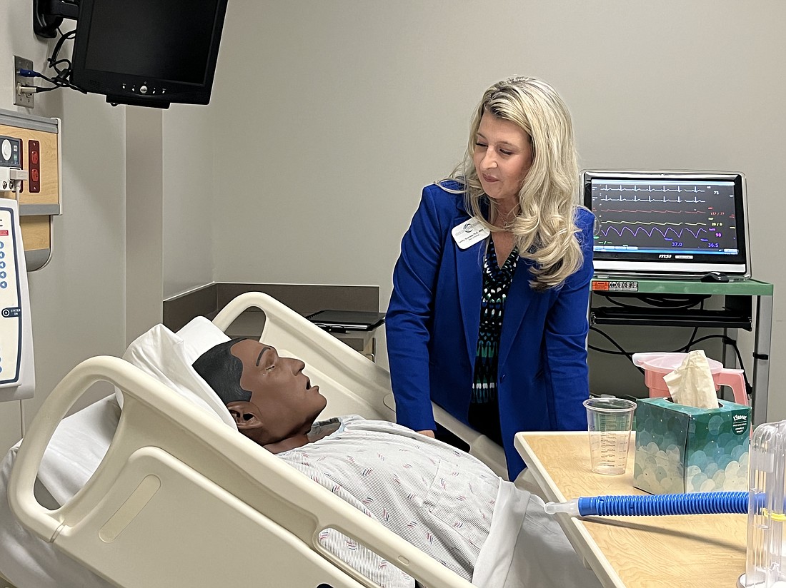 Tammy Sawmelle, the dean of nursing for the State College of Florida, shows how a simulation works. Nursing students are able to go through simulations in SCF's neonatal unit, birthing suite, pediatric ICU, medical ICU, trauma ICU, surgical ICU, neuro ICU and cardiovascular ICU.