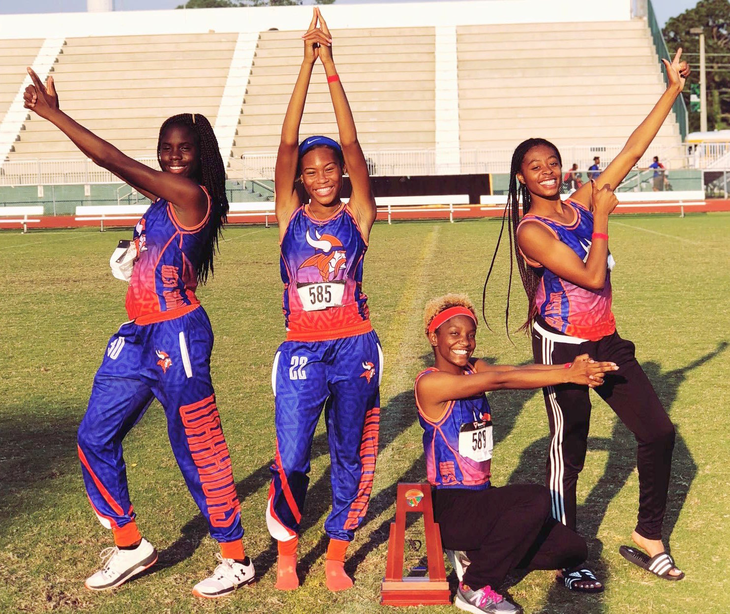 The West Orange girls 4x400 meter relay team of Jahnile Registre, left, Shyanne Mayes, Jasmine Williams and Taryn Dotson helped the Warriors secure a regional championship in a thrilling race.