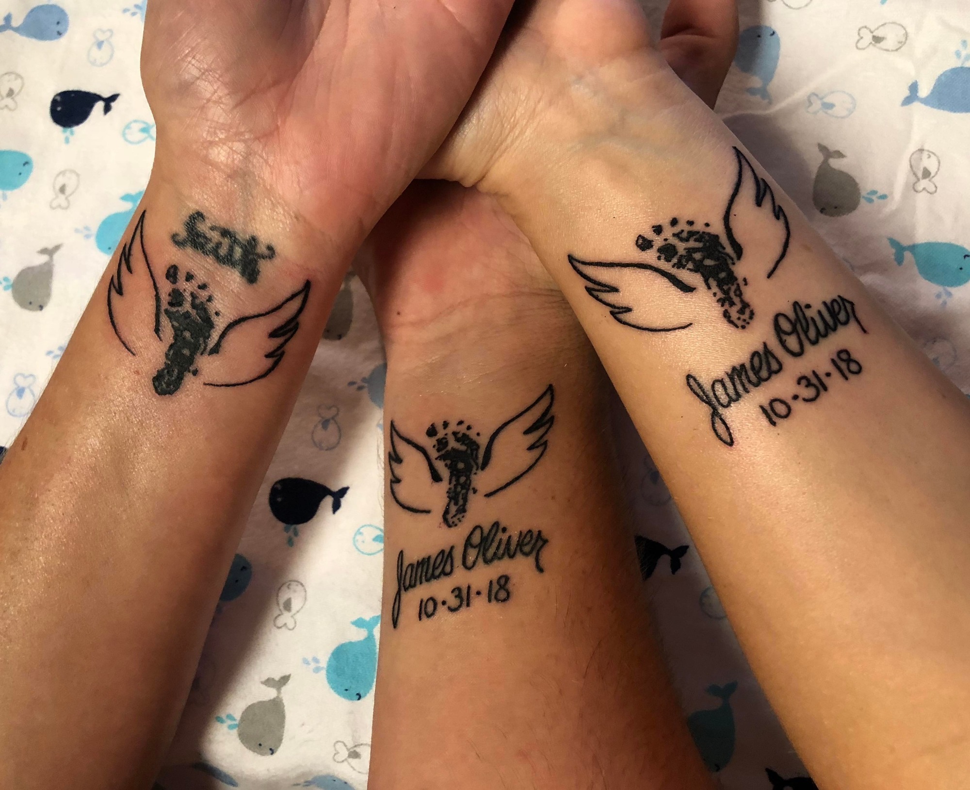 Britni and Zach Sauls — along with Britni’s mother — all got matching tattoos with Ollie’s footprint and angel wings.