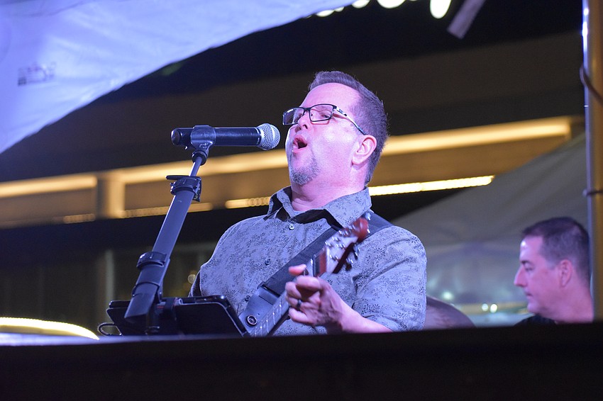 Donnie O'Neal is the singer for Kingpin Band, which performed during the Night Market at UTC in Sarasota.