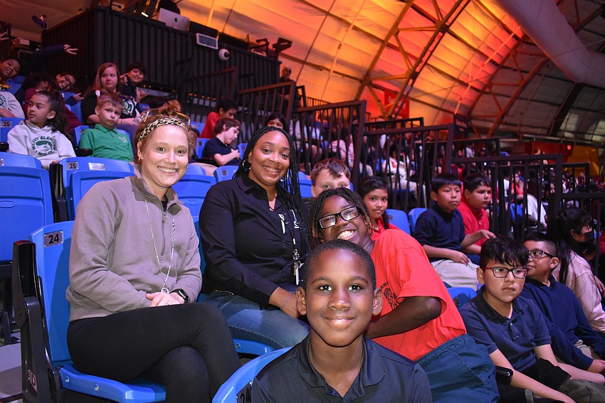 Manatee Elementary teacher Jessica Nunemaker and Sabrina Hamilton with Manatee Elementary students Jarques Randell, Shawn Ogletree, Landon Whaley and Maria Estrada Perez.