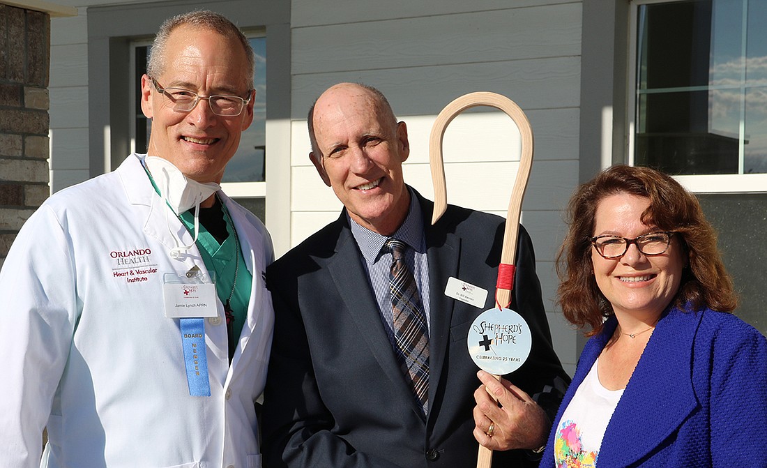 Shepherd's Hope Immediate Past Chair Jamie Lynch, founder Dr. Bill Barnes and Pam Gould.