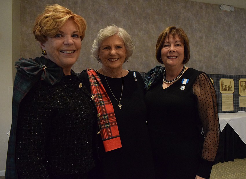 Venice's Carol Schwenk, Susan Stewart and Carole Cornell have fun at the Burns Supper. 