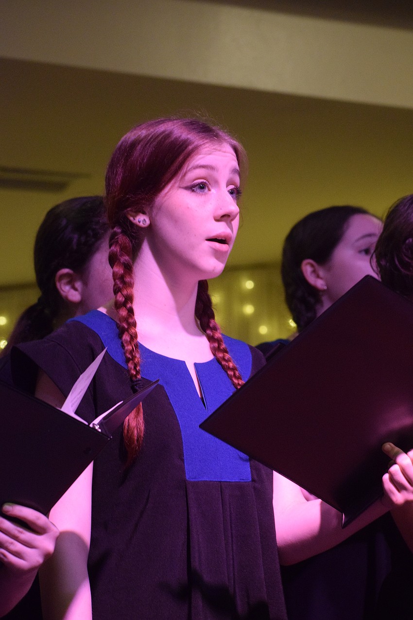 Olivia Schnell performs with Sarasota Young Voices at the St. Andrew Society of Sarasota's Burns Supper.