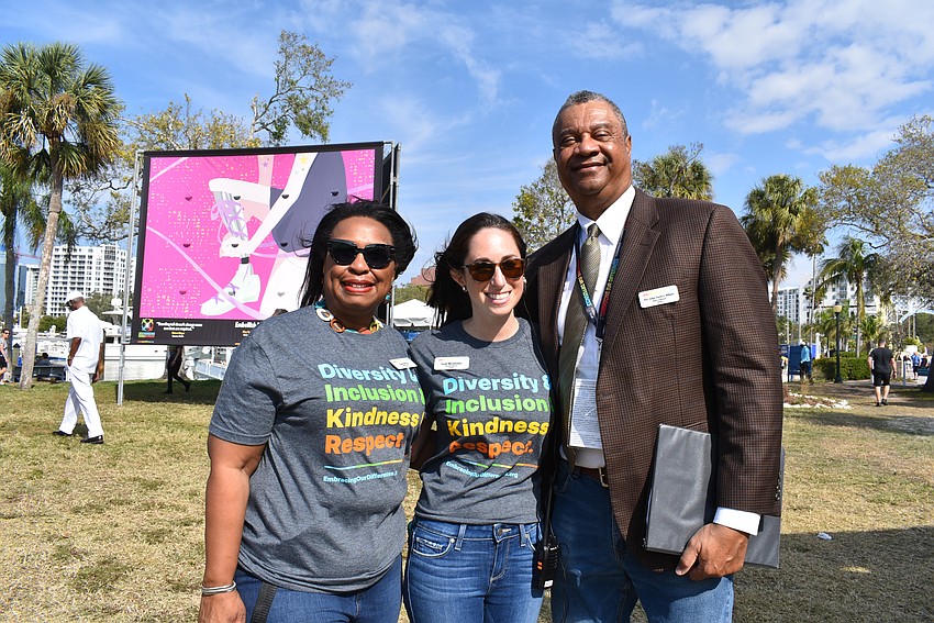 Exhibit Director Sheila McKoy, Executive Director Sarah Wertheimer and  Hon. Judge Charles E. Williams greets the community.