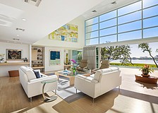 Living spaces include ceilings up to 17 feet high with floor to ceiling windows.