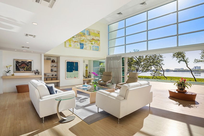 Living spaces include ceilings up to 17 feet high with floor to ceiling windows.