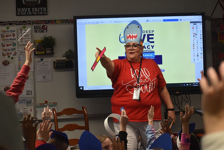 Bay Haven’s Fourth Grade Teacher Mrs. Jennette Schwaed quizzes students.