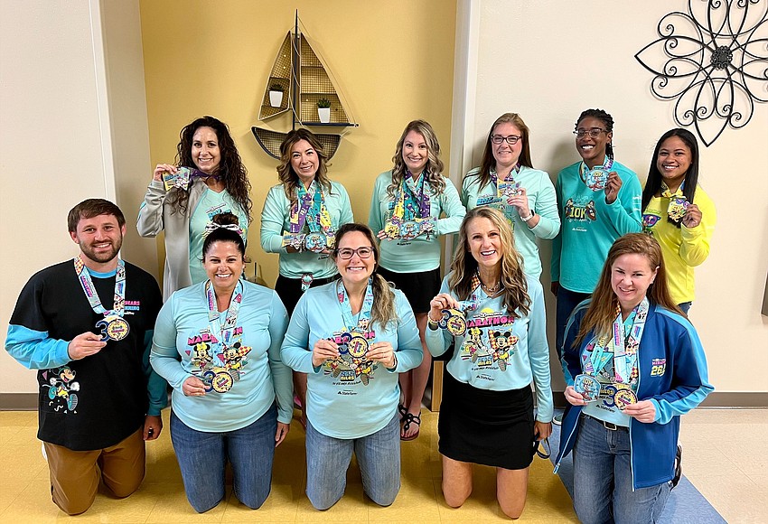 Water Spring teachers earn Disney running medals West Orange Times
