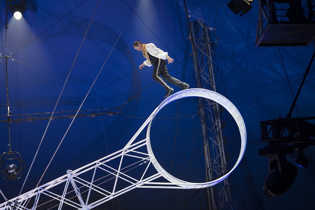 Besides being a ringmaster, Sarasota's Joseph Bauer performs death defying stunts on the Wheel of Death.