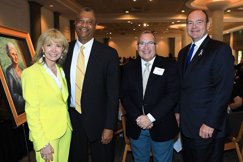 Charlie Anne Syprett, Judge Charles Williams, judge Daniel Weiss and honoree Larry Smith