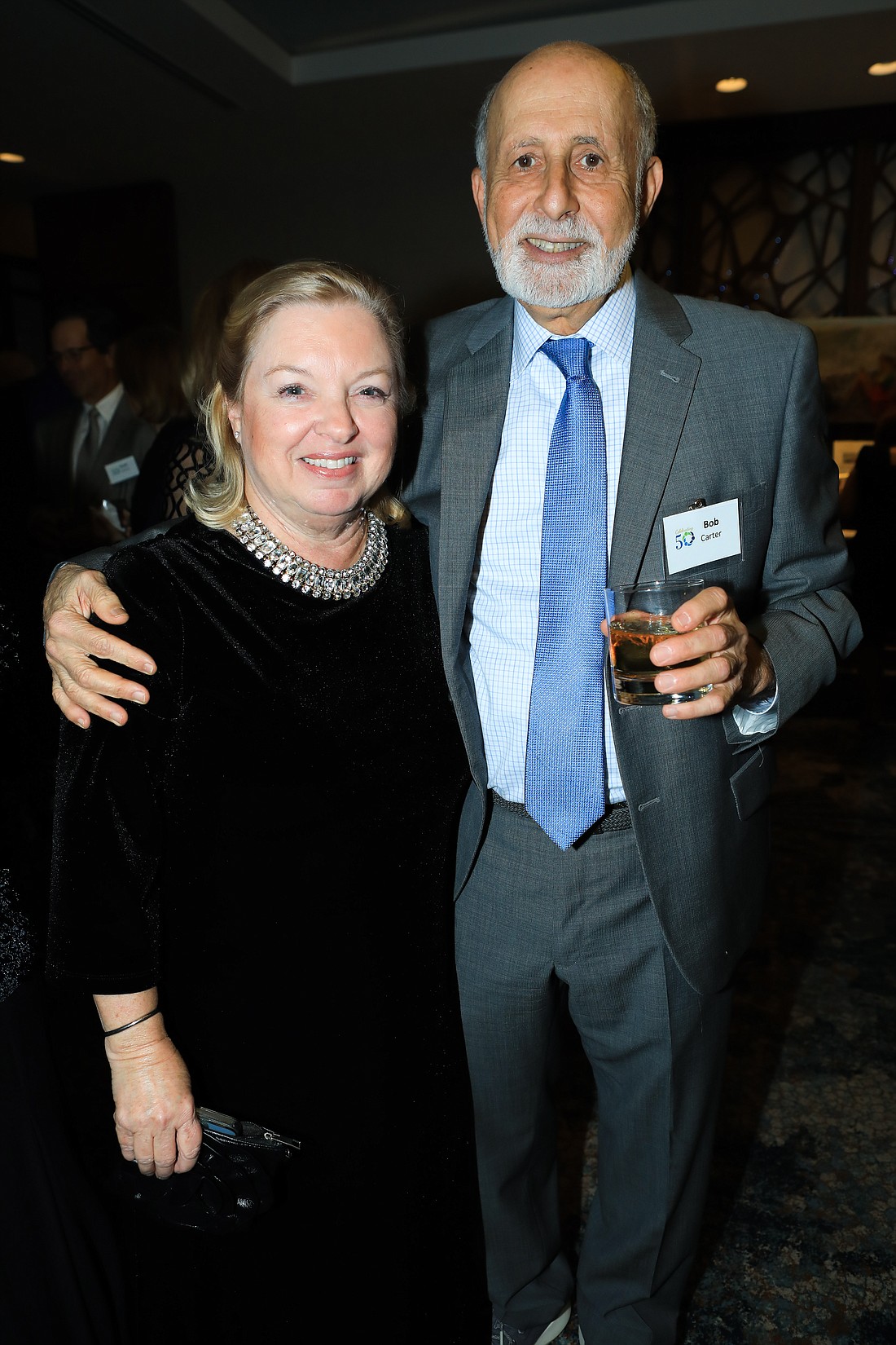 Your Observer | Photo - President and CEO Erin McLeod with Bob Carter