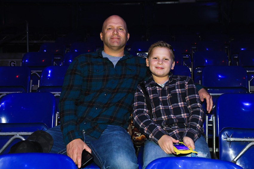Garrett and Cooper Shaffer sit to see Isabella Shaffer perform.