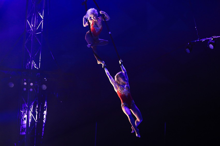 Maryna Tkachenko and Anastasiia Kornieieva soar with a duo strap performance.