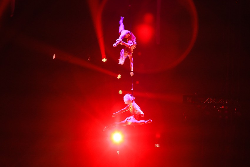 Maryna Tkachenko and Anastasiia Kornieieva soar with a duo strap performance.