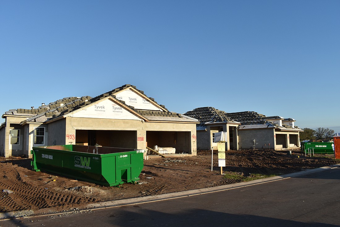 Construction on homes takes place in Sweetwater, Lakewood Ranch.