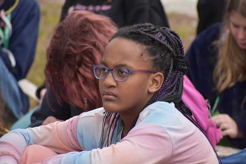Lakewood Ranch 11-year-old Maia Bacchus watches a presentation by the Manatee County Sheriff's Office.