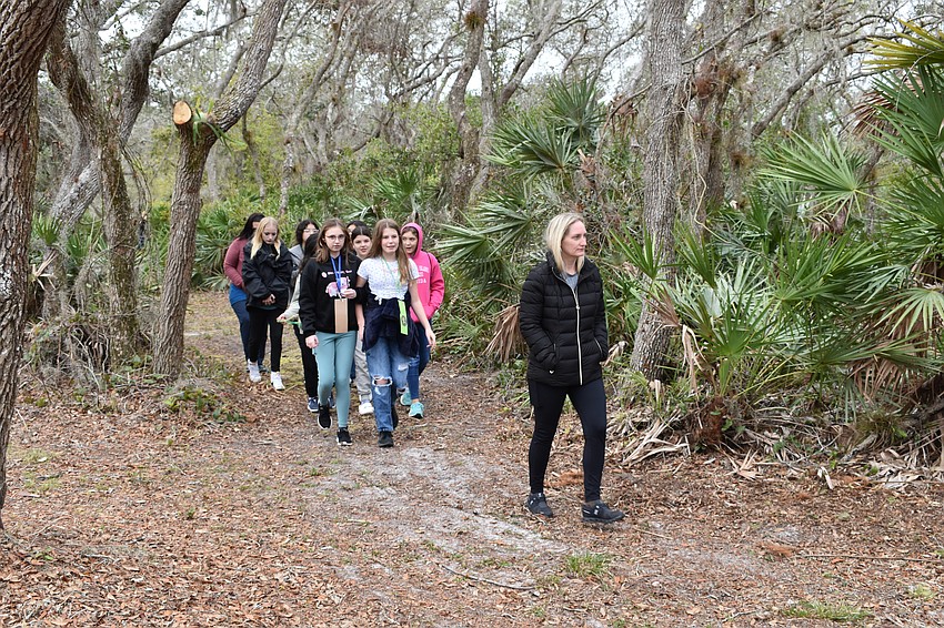 Lakewood Ranch's Sumer Jahn leads her group through the woods, teaching survival skills while on the move.
