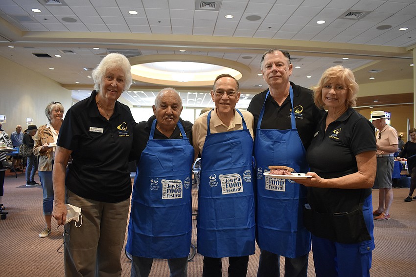Patty Schreiber, Stan Liner, Steve Swedlow, Pearl Perlinski and Patty Glah celebrate the 15th annual Sarasota Jewish Food Festival.