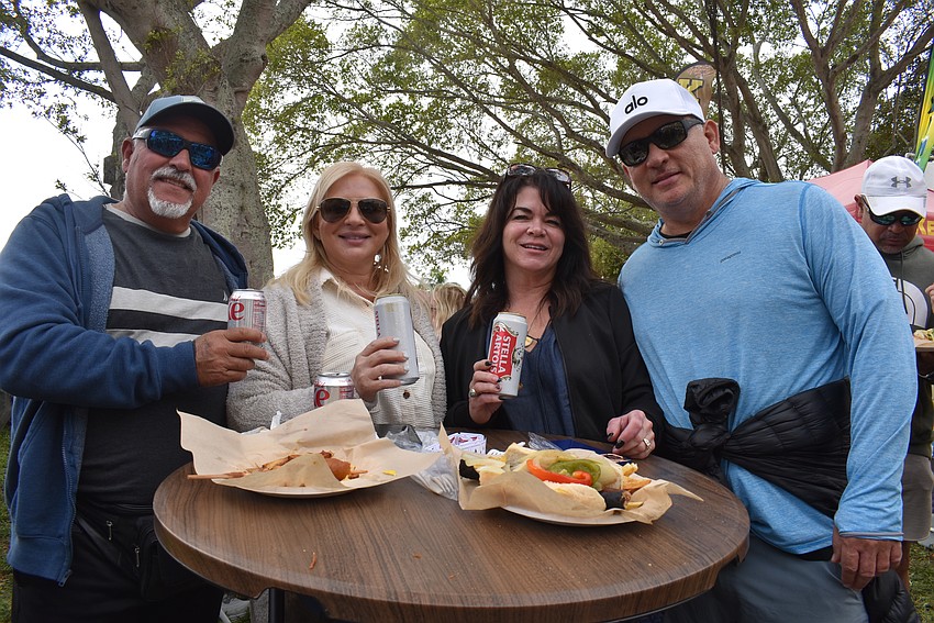 George and Onner Fleites with Maricel and Eddie Rodriguez enjoy the 7th Annual Sarasota Seafood and Music Festival
