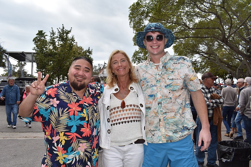 Jerry Vang, Marie and Maxim Lange celebrate at the 7th Annual Sarasota Seafood and Music Festival.