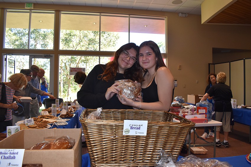 Sitar Ben-Herut and Else Weinstien sell homemade baked goods at Sarasota Jewish Food Festival.