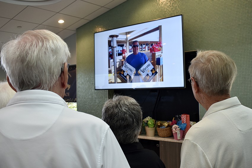 A loop of photos plays in the clubhouse.