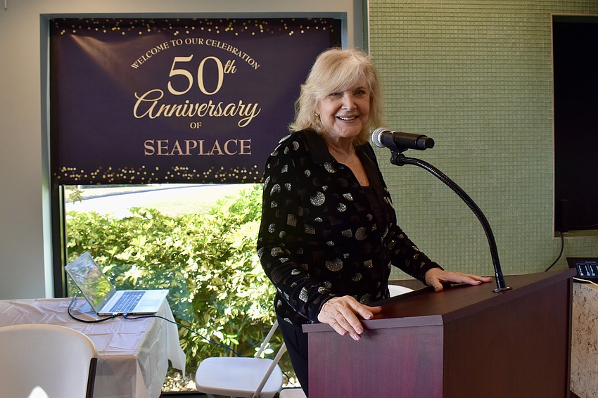 Donna Cornell serves as master of ceremonies.