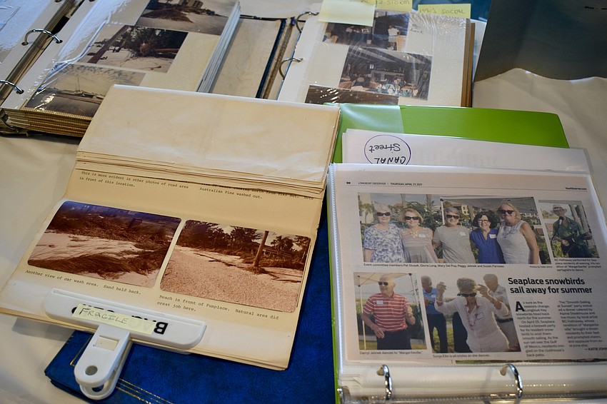 Old photo albums that were borrowed for the celebration.