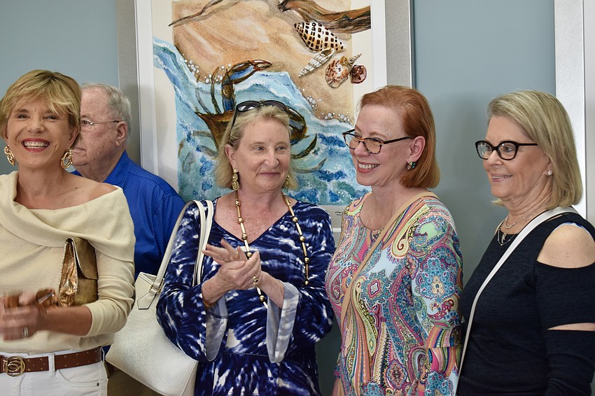 Former tresurer Irene Hagman, commissioner-elect Deborah Murphy, commissioner Penny Gold and resident Judy Herman