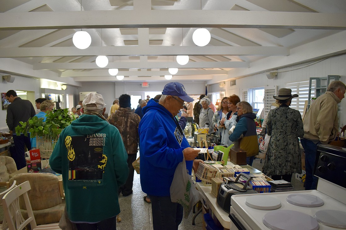 The clubhouse at Gulfshore filled up quickly on Saturday morning for the community's annual Trash to Treasure sale.