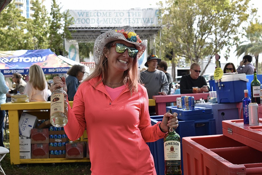 Krystal Twinney mixes up drinks for attendees.