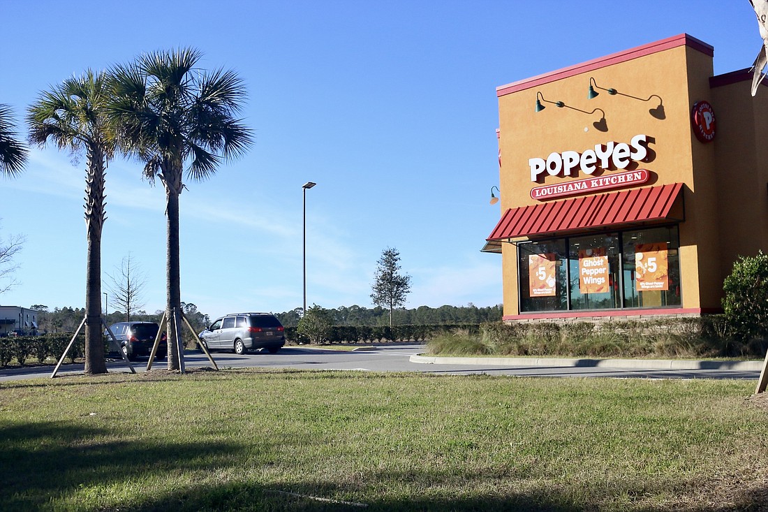 If approved, the Dunkin Donuts will be in the lot on the left of the Popeyes on SR 100. Photo by Sierra Williams