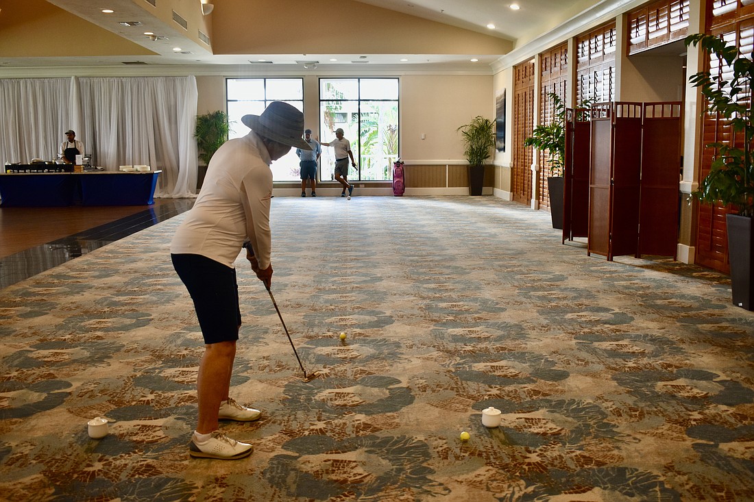 Carol Swed hits a "hole in one."