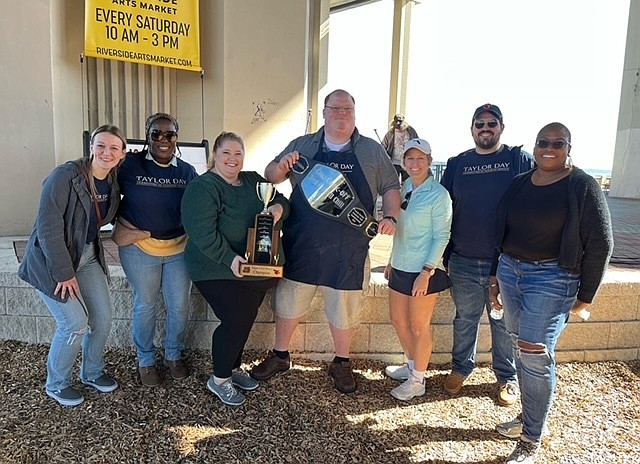 The Taylor Day team won the 2022 Best Overall Championship Belt sponsored by North Florida Financial: From left, Justice Elvish, Ashleigh Brooks, Megan Reese, Ryan Reese, Christina Williams, Nicholas Busse and Sharron Watson.