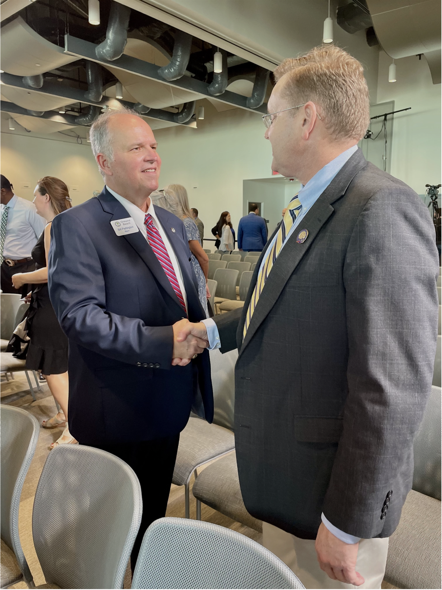 Mayor Bill Partington shakes hands with FDOT District 5 Secretary John Tyler. Photo courtesy of the city of Ormond Beach