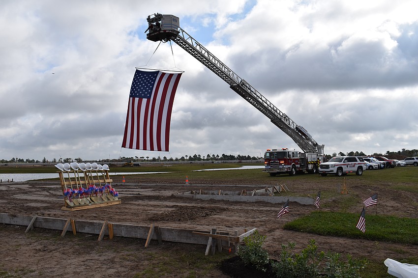 East Manatee Fire Rescue presented the flag to honor Army Sgt. Lucio Gaytan at his new homesite in Sapphire Point in Lakewood Ranch.