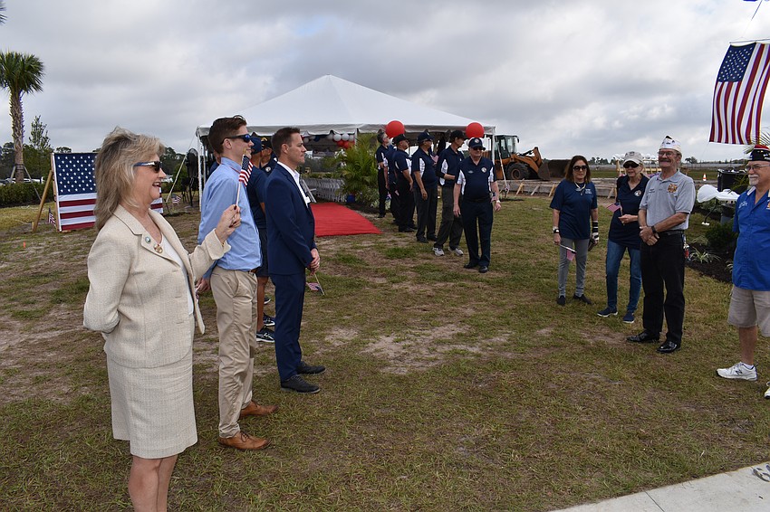 Manatee County District 5 Commissioner Vanessa Baugh. left, was among more than 300 people on hand to honor Army Sgt. Lucio Gaytan at his new homesite in Lakewood Ranch.