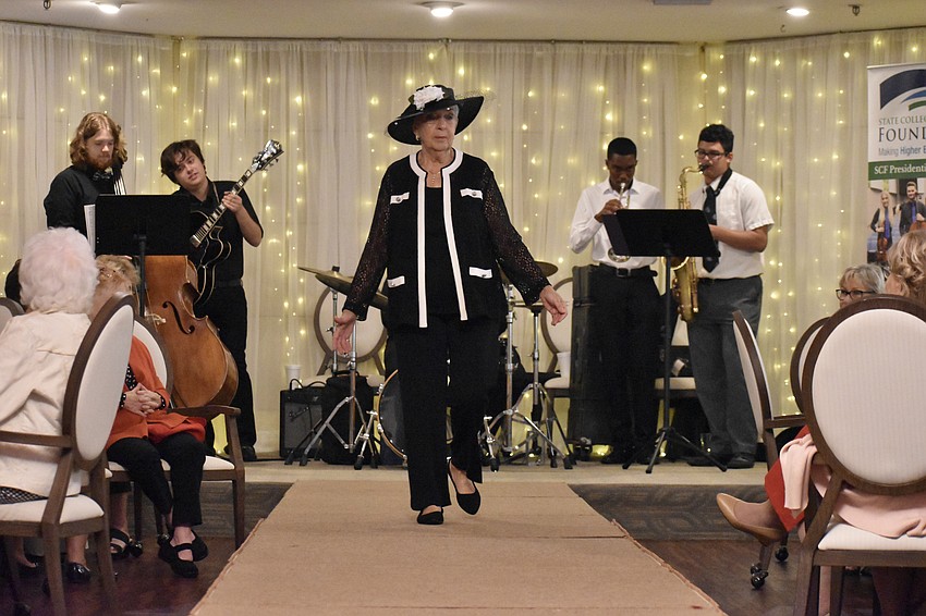 Be-Be Hanson begins her walk down the runway with a basic, but stylish, outfit.