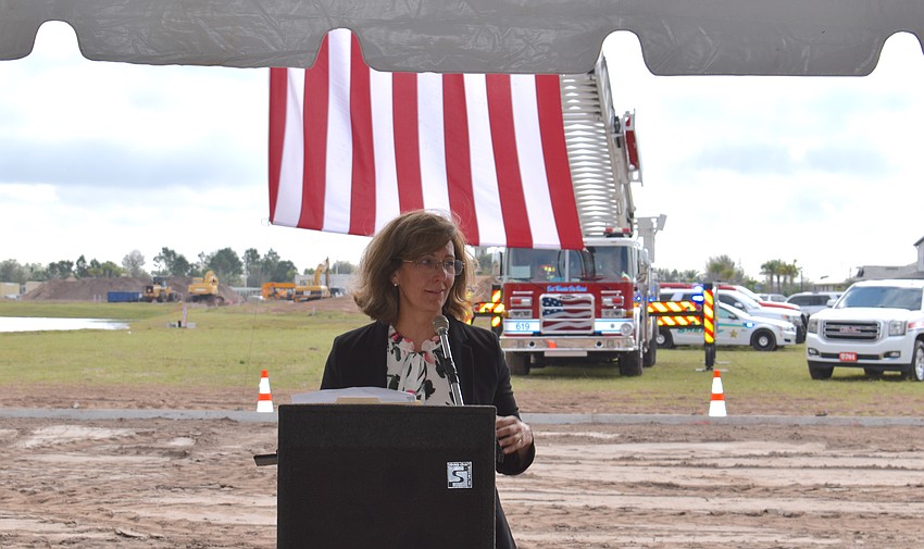 Laura Cole, a senior vice president with Schroeder-Manatee Ranch, told retired Army Sgt. Lucio Gaytan to 