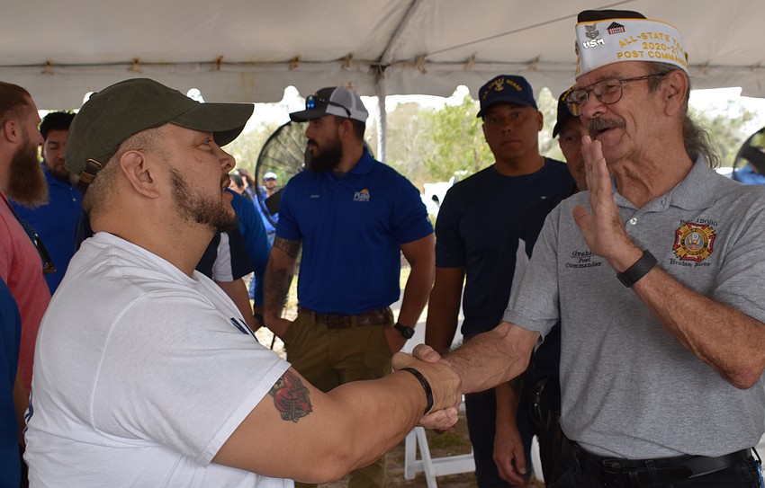 Army Sgt. Lucio Gaytan is welcomed to his new Lakewood Ranch Community by Graham Ellis of VFW Braden River Post 12055.