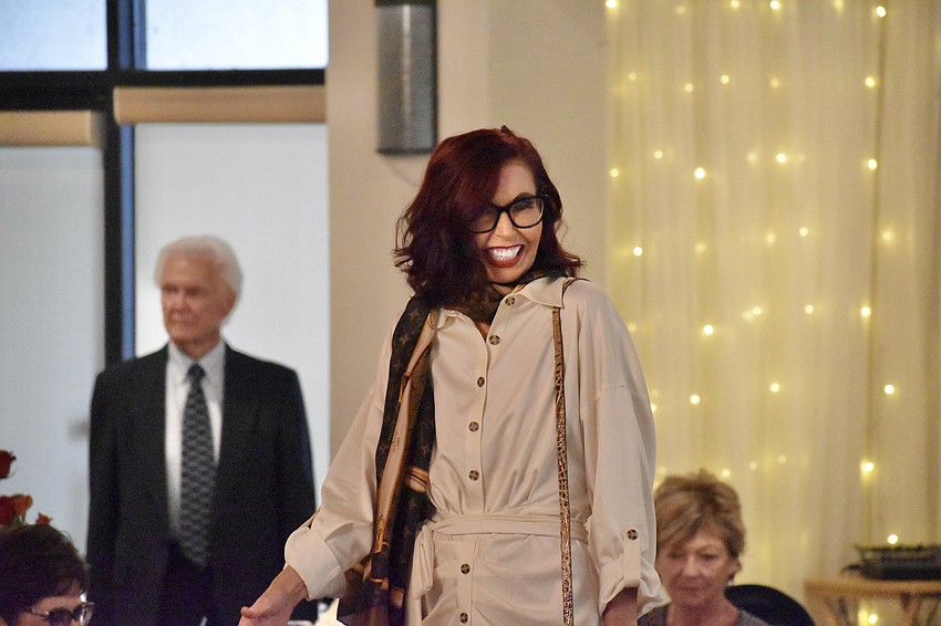 Palm Aire's Katherine Pike showcases a classy outfit, and a smile.