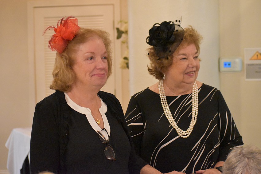 Event committee member Beverly Sullivan and Palm Aire Women's Club President Peg McKinley helped organize an event that raises scholarship funds.